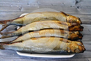 Smoked salty Herring forage fishes, salt-cured and smoked, also known as silver darlings, harvested for their flesh and eggs, and
