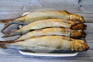 Smoked salty Herring forage fishes, salt-cured and smoked, also known as silver darlings, harvested for their flesh and eggs, and