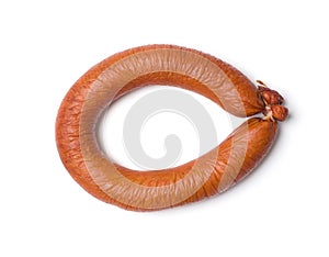 Smoked sausage ring on a white background