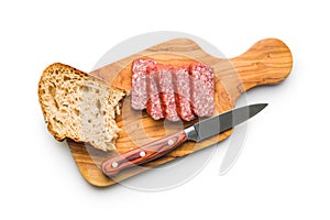 Smoked sausage. Sliced salami and bread isolatd on white background