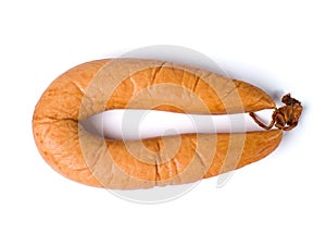 Smoked sausage on a white background. Meat snacks