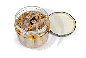 Smoked sprats preserved in vegetable oil in glass jar