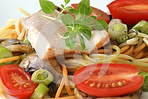 Smoked trout with colored spaghetti and vegetable