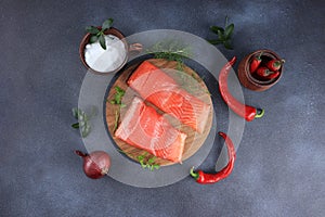 Smoked trout with salmon red fish Steak served with herbs, pepper and salt salmon Preparation Seafood healthy natural food Concept