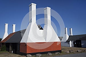 Smokehouse Chimnies. Bornholm, Denmark