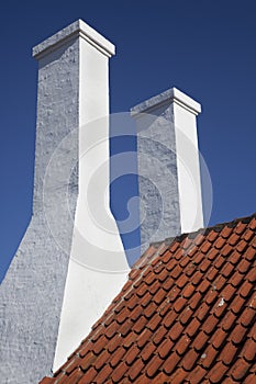 Smokehouse Chimnies. Bornholm, Denmark