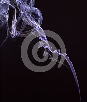 Smokes on black background