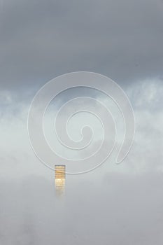 Smokestack in fog