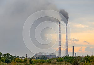 Smokestack at sunset horizontal