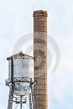 Smokestack and water tower for abandoned sugar mill