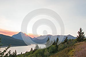 Smokey Sunset over Lower Two Medicine Lake in Glacier National Park in Montana USA durng the 2017 fall fires photo