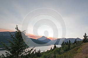 Smokey Sunset over Lower Two Medicine Lake in Glacier National Park in Montana USA durng the 2017 fall fires photo