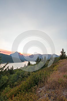 Smokey Sunset over Lower Two Medicine Lake in Glacier National Park in Montana USA durng the 2017 fall fires photo