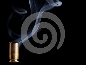 Smoking bullet casing