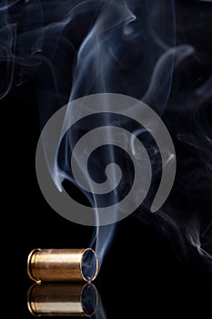 Smoking bullet casing