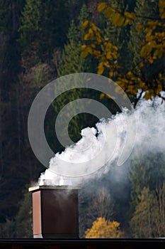 Smoking chimney of a house