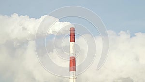 Smoking chimney from industrial pipes on heating plant. White smoke from boiler pipe on thermal power plant. Industrial