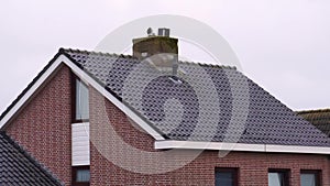 Smoking chimney on a rooftop, Dutch architecture, Heating the house