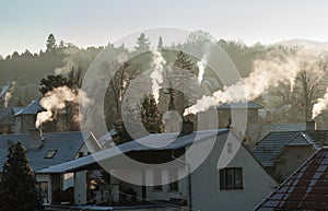 Smoking chimney smoke pollution, small house town