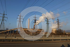 Smoking chimney of thermal power station and high voltage electric pole and transmission lines