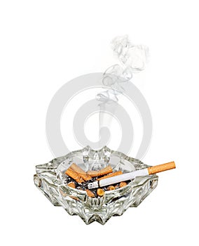 Smoking cigarette in ashtray