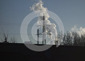 Smoking factory chimney or smokestack