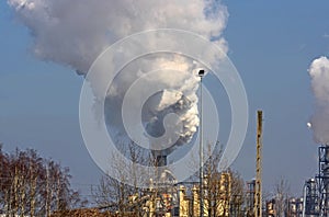 Smoking factory chimneys.