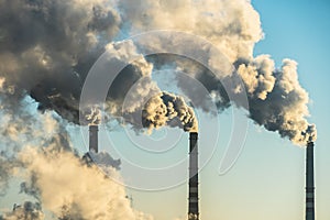 Smoking factory chimneys.Environmental problem of pollution of environment and air in large cities.Climate change,ecology and