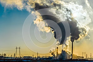 Smoking factory chimneys.Environmental problem of pollution of environment and air in large cities.Climate change,ecology and