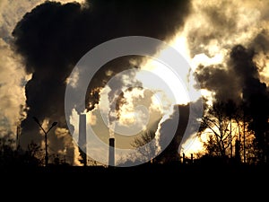 Smoking factory chimneys in morning