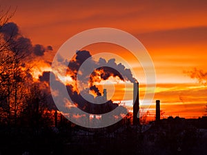 Smoking factory chimneys in morning