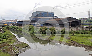 Smoking factory in outskirt of Santander city