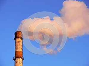 Smoking factory pipe closeup