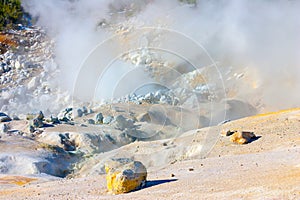 Smoking fumaroles of Bumpass Hell, Lassen Volcanic park, California. photo