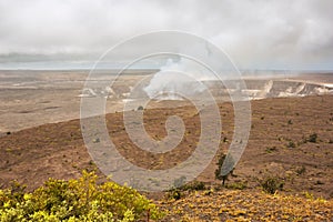 Smoking Halema uma u Crater in the Kilauea Caldera
