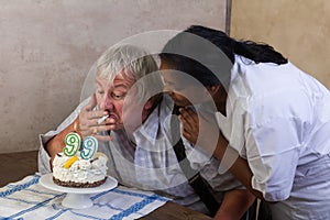 Smoking old man on birthday