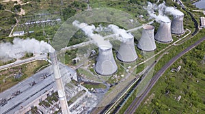 Smoking pipes of thermal power plant at summer