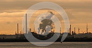 Smoking power plant and oil refinery