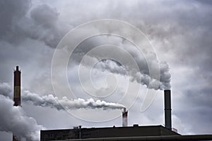 Smoky chimney factory polluting the environment and the air