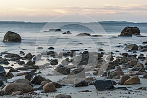 Smoky motion blur rocky Buzzards Bay beach