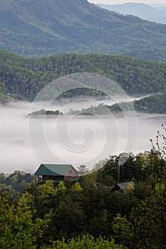 Smoky Mountain cabin surrounded by fog