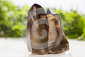 Smoky quartz on a white background mineral specimen.