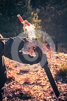 Smoky Shotgun Shells Ejection photo