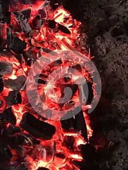Smoldering coal fire in the night