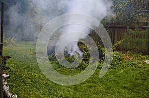 smoldering fire in a backyard