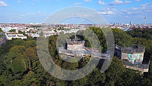 Smooth aerial top view flight drone. Bunker Berlin Mitte Flak Tower Humboldthain