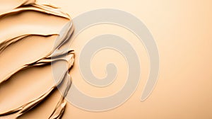 Smooth beige foundation texture on cream background