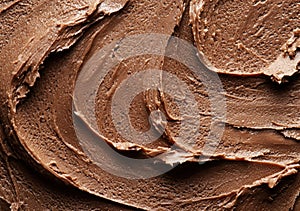 Smooth and creamy chocolate frosting texture photo