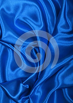 Smooth elegant blue silk as background