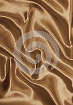 Smooth elegant golden silk as background. In Sepia toned. Retro